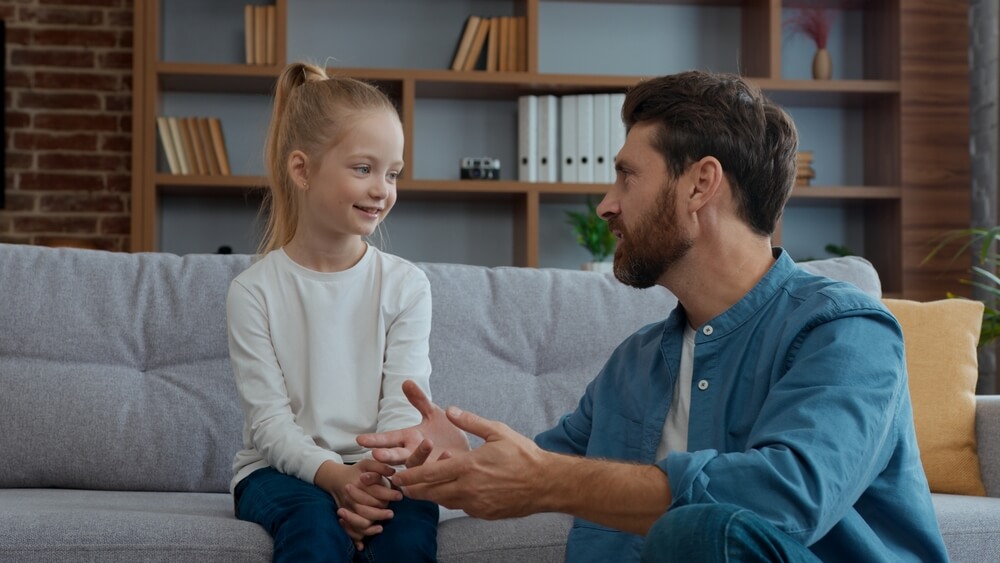 Father talking with daughter about child custody concerns in New Jersey